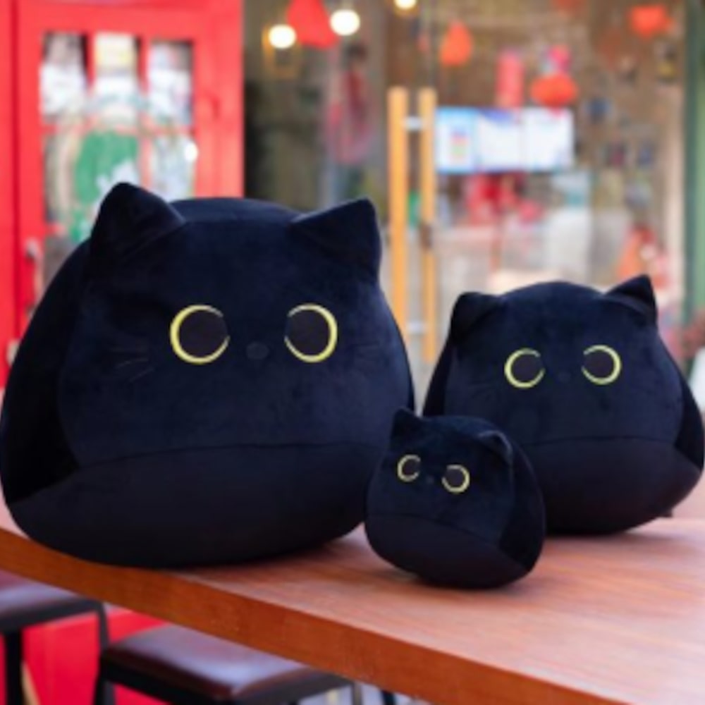 Black cat cuddly toy on sale