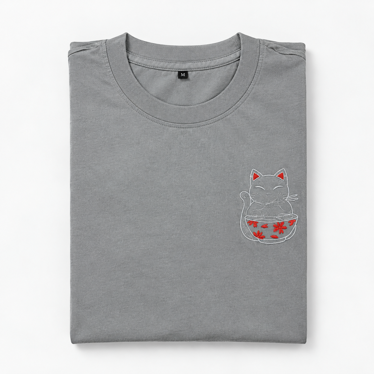 GefaltetesgrauesT-ShirtmitGlueckskatze.png